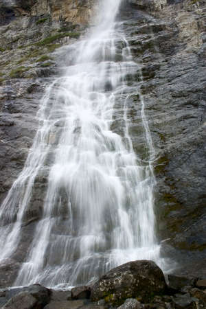 Waterfall on a precipice in Caucasus mountainsの写真素材