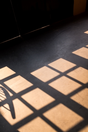 Sun light through the window make contrast shadowの写真素材