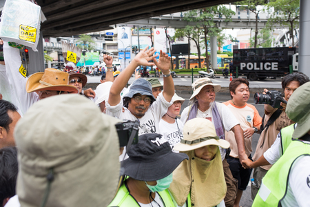 BANGKOK - September 22   Sasin Chalermlarp the leader of protest as Stop EHIA campaign at Pathum Wan Intersection in Bangkok, Thailand のeditorial素材