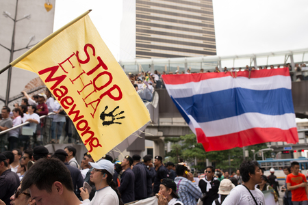 BANGKOK - September 22   Protester s sign showing as Stop EHIA campaign at Pathum Wan Intersection in Bangkok, Thailand のeditorial素材