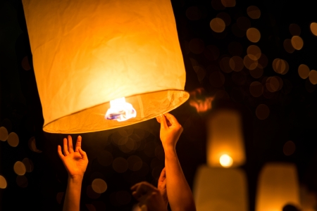 People is launching sky lantern to the skyの写真素材