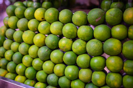 Stack pile of lemon lime friutの写真素材