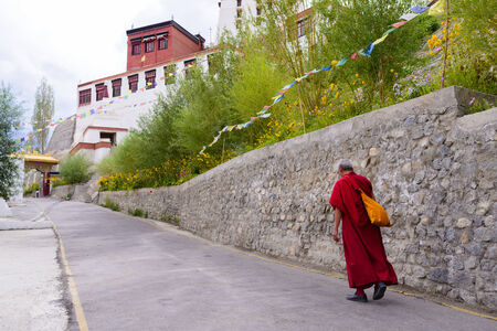 Lama monk walking in Hemis gompa in Leh Ladakh ,India