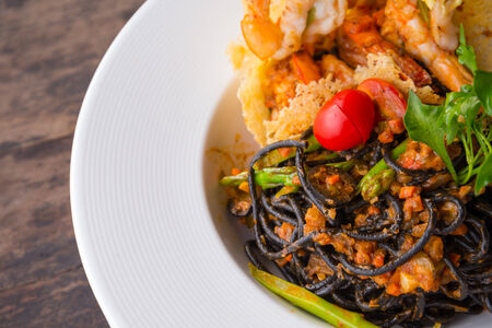black ink spaghetti fried shrimpの写真素材