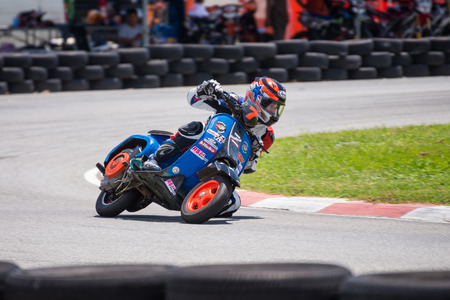 CHONBURI - MAY 9,2014 : Unidentified racer in Vespa in Super Moto 2014 on May 9 at Bira International Circuit, Chonburi, Thailandのeditorial素材