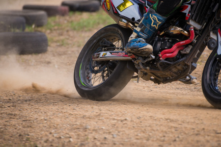 CHONBURI - MAY 9,2014 : Unidentified racers in Super Moto 2014 on May 9 at Bira International Circuit, Chonburi, Thailandのeditorial素材