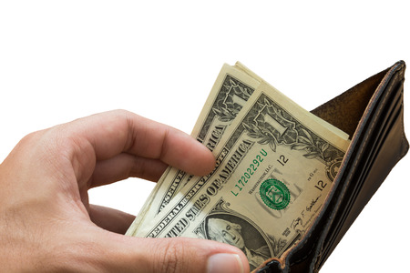 hand picking dollar bills from wallet, isolated