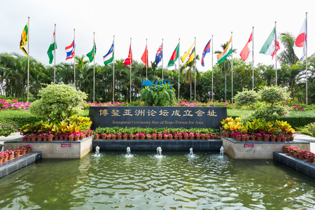 BOAO  CHINA MAY 11 : international flags Inaugural Ceremony Site sign in front of Boao forum for asia theme park in Hainan ChinaMay 11 2015のeditorial素材