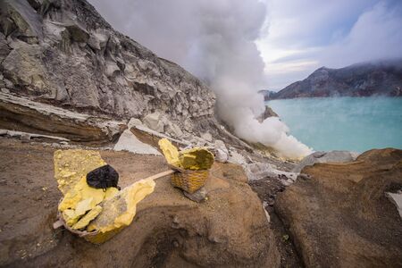 sulfur basket collected from Kawah Ijen volcanoの写真素材