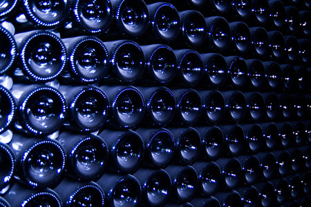 The bottom of bottles with champagneの写真素材