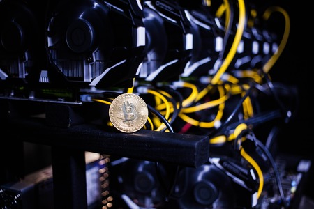 The gold coin bitcoin is on the system unit