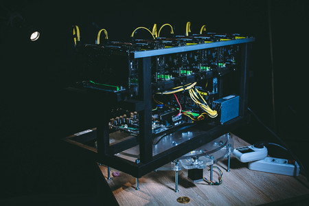 Farm bitcoin with a coin and a meter stand on the tableの写真素材