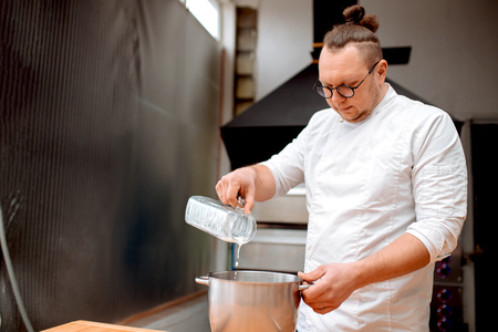 The chef prepares doughの写真素材
