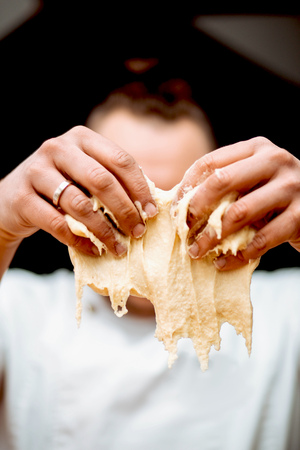 The chef prepares doughの写真素材