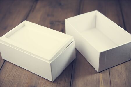 new phone box on the wooden tableの写真素材