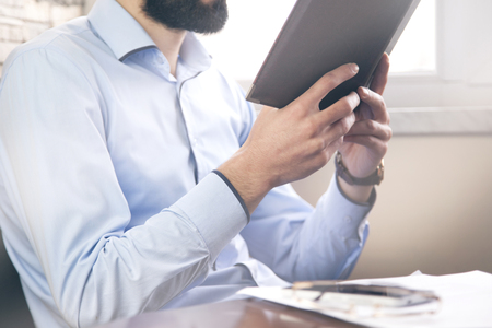 young business man  reading in officeの写真素材