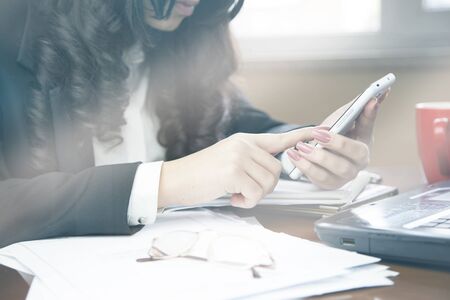 business woman working in the work tableの写真素材