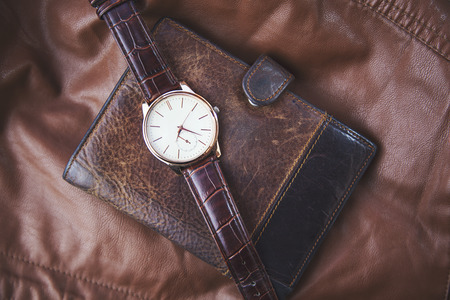 watch on wallet on  leather backgroundの写真素材