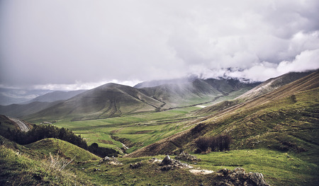 road through the mountains, cloudy dayの写真素材