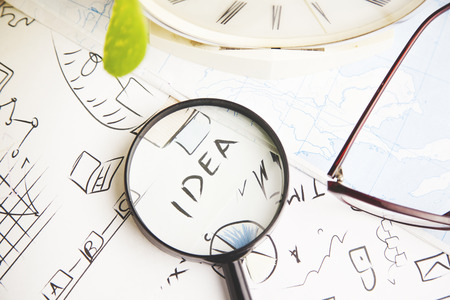 idea writing on magnifying on tableの写真素材