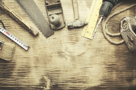 painting frame and tools on wooden tableの写真素材