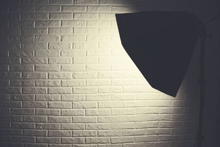 photo light  on Brick wall backgroundの写真素材