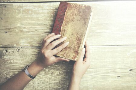 woman hand book for reading concept backgroundの写真素材