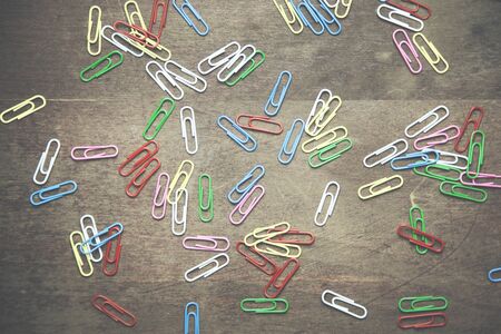 colorful Clip on wooden table background