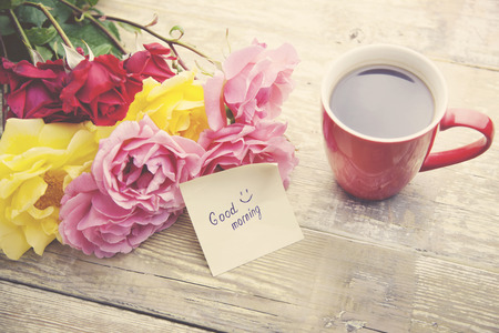 coffee, rose and '' good morning '' writing on paperの写真素材