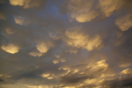 Fiery sunset sky. Beautiful clouds