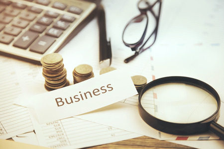 Business, money and differet items on documentsの写真素材