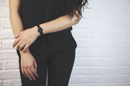 Woman in black elegant clothes in studioの写真素材