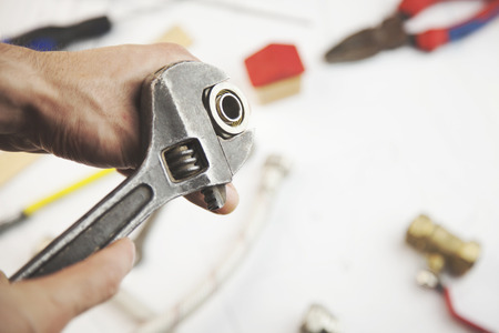 man repair in  tools on paper