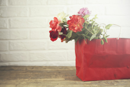 Beautiful flowers  on brick  wall backgroundの写真素材