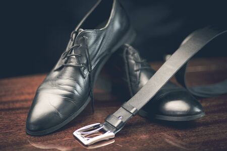 stylish leather men's dress shoes and beltの写真素材
