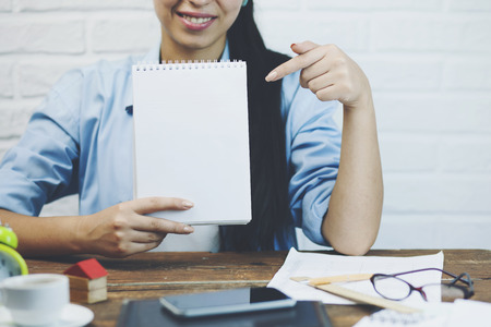 Businesswoman working in officeの写真素材