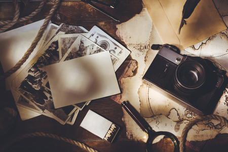 photos and camera on te old mapの写真素材