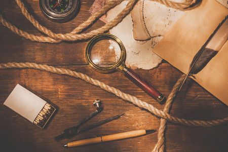 An old brass compass on map backgroundの写真素材