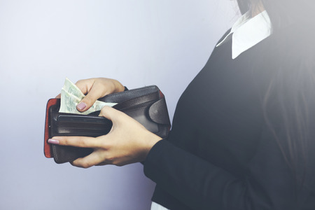 woman hand  wallet and money