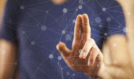 businessman touching virtual screen with cyber iconの写真素材