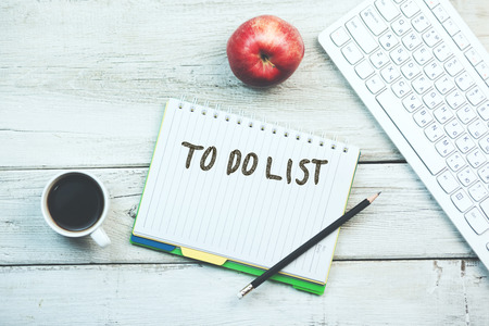 keyboard,coffee, apple and notepad with text  to do list