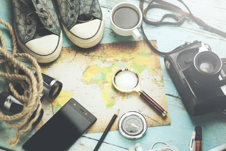 Outfit of traveler on the wooden backgroundの写真素材