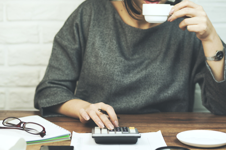 business woman working in office and and coffeeの写真素材