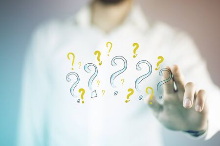 young business man hand question marks on white background