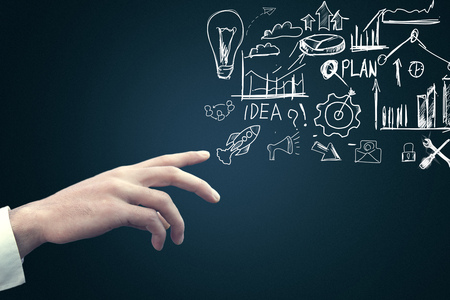 businessman drawing social network concept in blue backgroundの写真素材