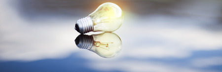  light bulb in blue and green background