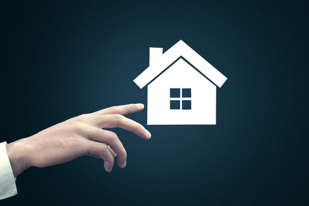 man hand  house on  virtual screenの写真素材