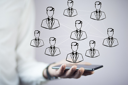 young  businessman hand phone  on digital virtual screenの写真素材