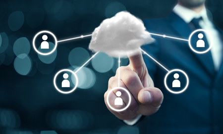 Businessman with cloud  and social network on bokeh technology background