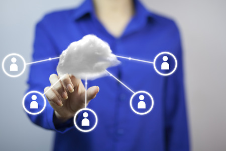 Business woman with cloud and social networkの写真素材